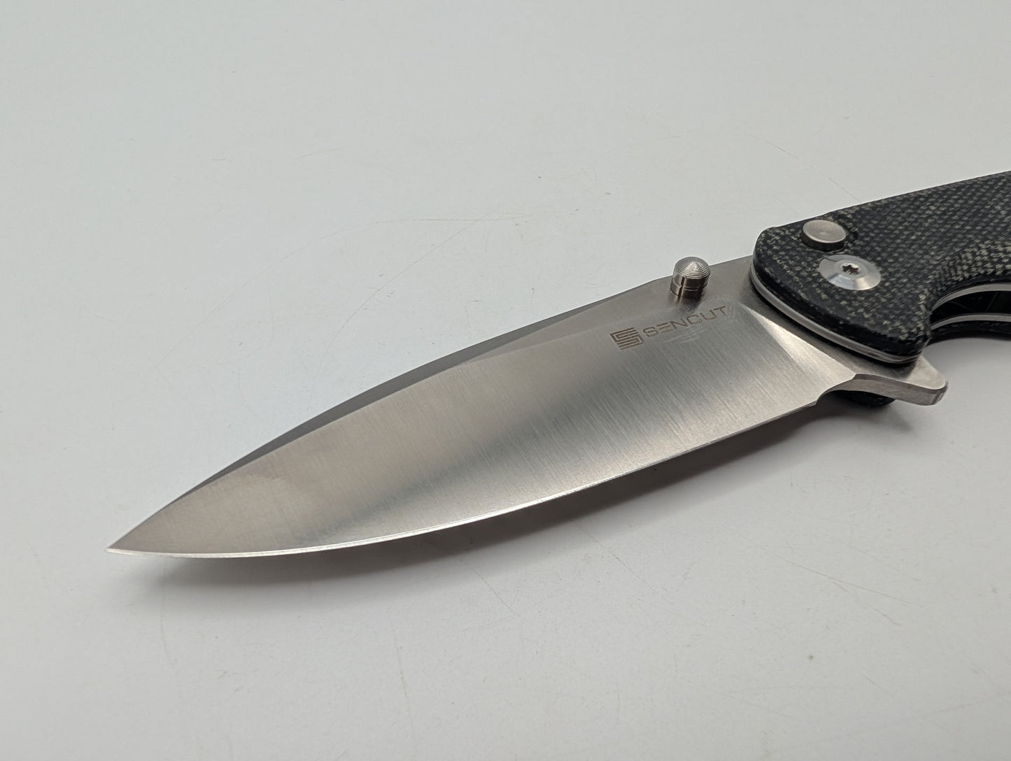 Sencut Crowley Black Micarta – Grade B