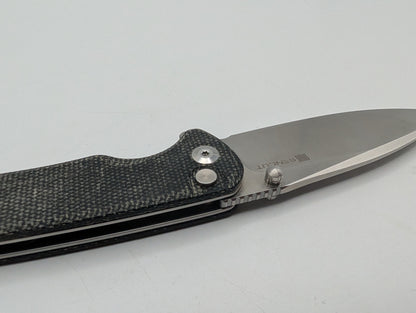 Sencut Crowley Black Micarta – Grade B