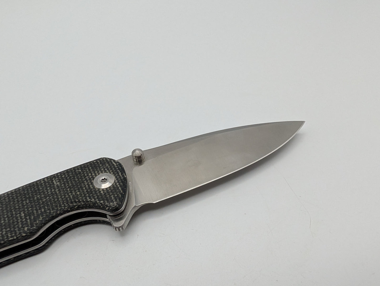 Sencut Crowley Black Micarta – Grade B