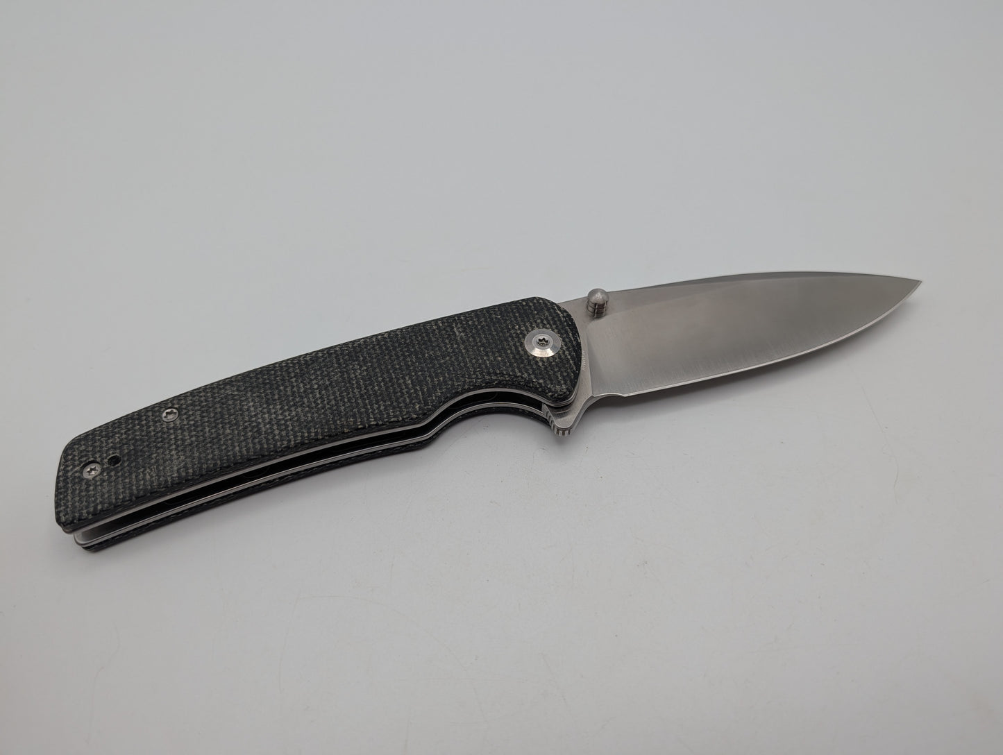 Sencut Crowley Black Micarta – Grade B