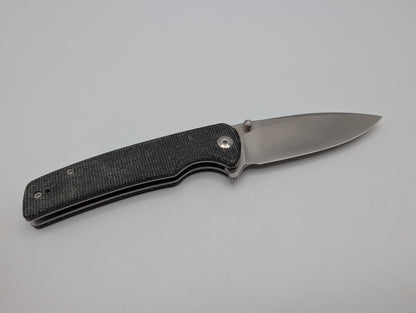 Sencut Crowley Black Micarta – Grade B