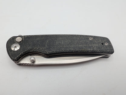 Sencut Crowley Black Micarta – Grade B