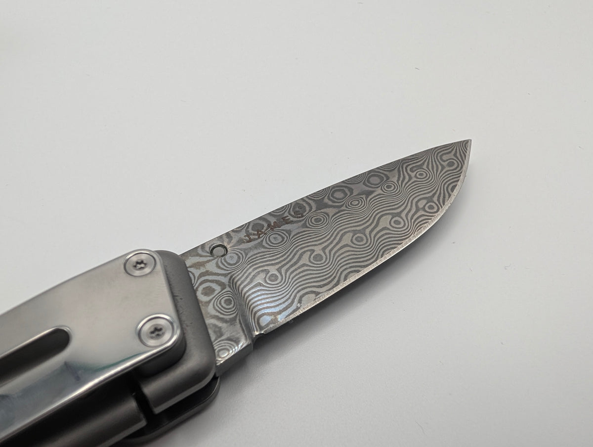 The James Brand The Chapter Titanium Damasteel – Grade A